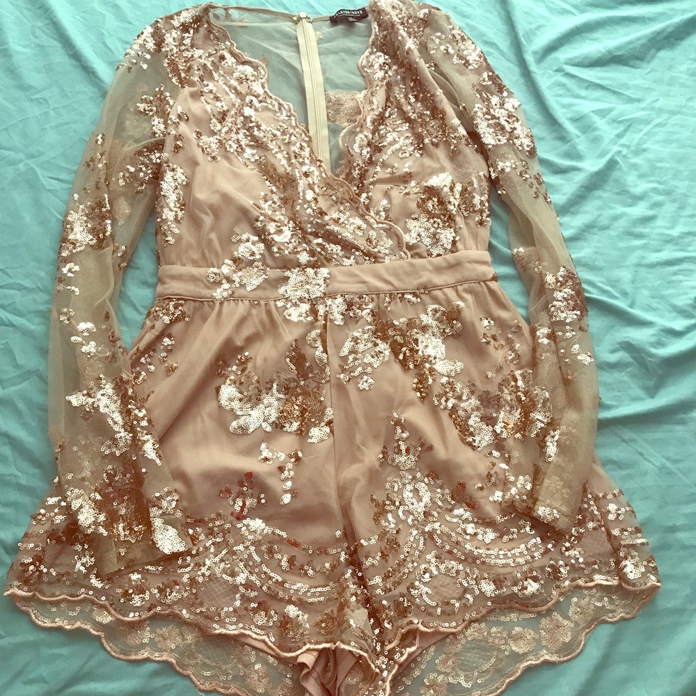 Gold accent Fashion Nova Jumpsuit.